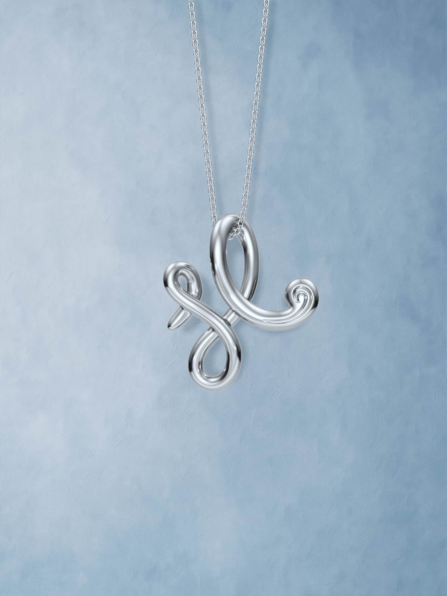 The X Pendant